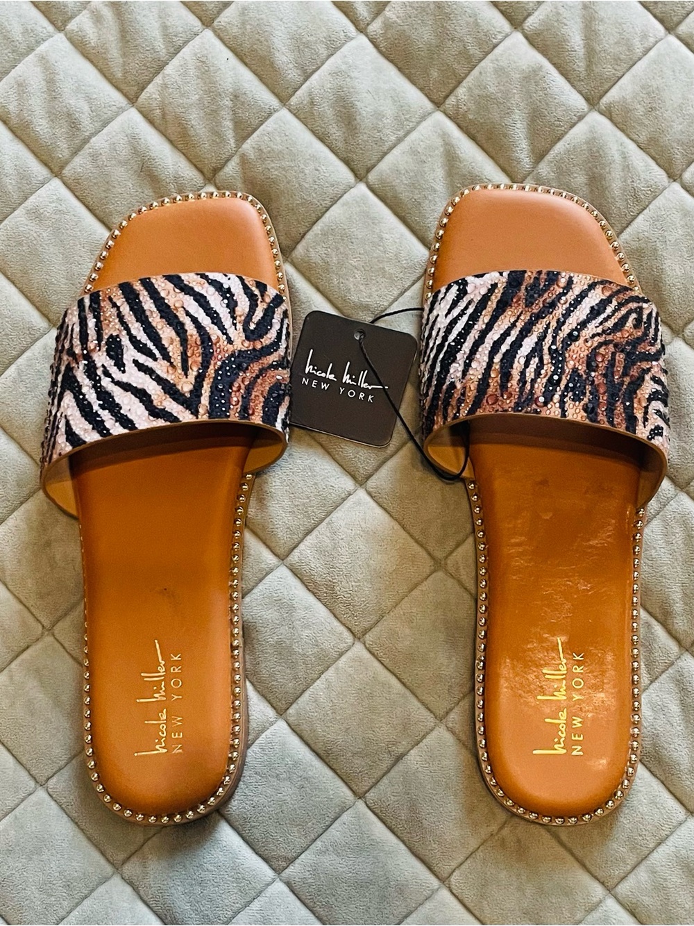 Nicole Miller Zebra-Print Slide Sandals in Black and Tan